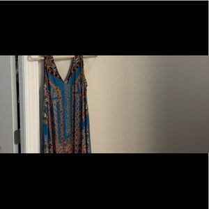Maxi sundresses size L; sleeveless tops, M/L; pants size 12